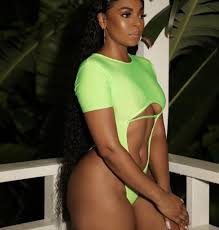 Ashanti flaunts her incredible physique in new swimwear photos