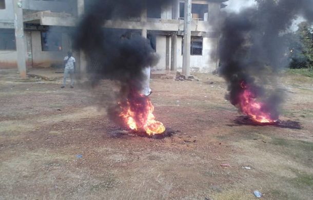 Irate anti-Muntaka protesters burn tyres, lock up party office in Kumasi