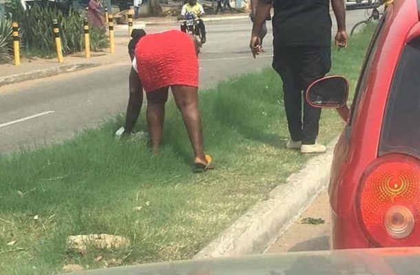 PHOTOS: Lady ordered by policeman to handpick for littering