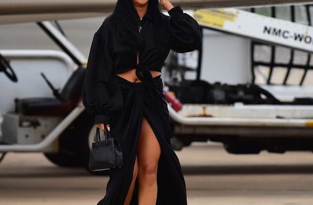 PHOTOS: Rihanna flaunts hot legs in sexy thigh-high split skirt as she touches down in Barbados