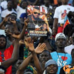 PHOTOS: Thousands of fans troop out pay tribute to late DJ Arafat at his burial 'concert'