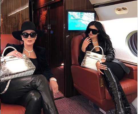 Kylie Jenner and her mom Kris travel in style as they board a private jet to a 'business meeting'
