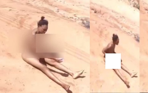 SHOCKING VIDEO: Ghanaian lady strips nak*d, drags her butt on the street to curse ex boyfriend who dumped her
