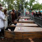Theme park company pays couples $600 to lie in a coffin for 30 hours for Halloween