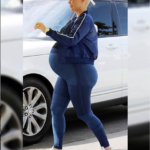 Heavily pregnant Amber Rose showcases her huge bump in new photo