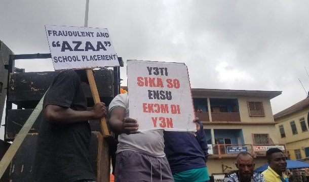 PHOTOS: Group demonstrates against high cost of living