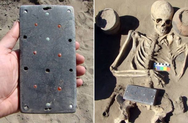 INCREDIBLE: Archaeologists discover ancient skeleton buried with '2,100 year old iPhone'
