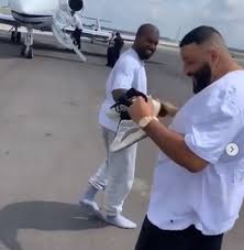 VIDEO: Kanye West removes unreleased Yeezy sneakers from his feet to gift DJ Khaled; walks bare footed