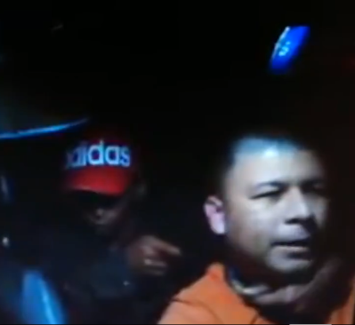 VIDEO: Brave Taxi driver held to a gun point in his car fights off gunman