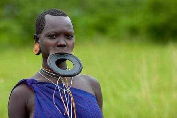 The mysterious history and meanings of African tribal lip plates and why women wear them