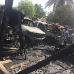 Mechanic shop fire burns five cars, house