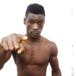 VIDEO: Boxer Patrick Allottey in trouble after beating football fan during Hearts vs Kotoko clash