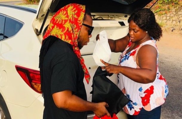 COVID-19: Edem and wife provide free meal to security personnel, share money to fans