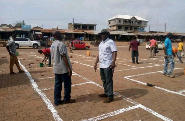 COVID-19: MCE inspects lane marking works in Techiman Central Market