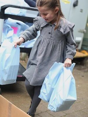 Princess Charlotte takes food to those in need as she turns five