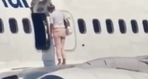 Video: Woman Walks on Wing of Parked Plane in Kiev After Complaining of Being Hot