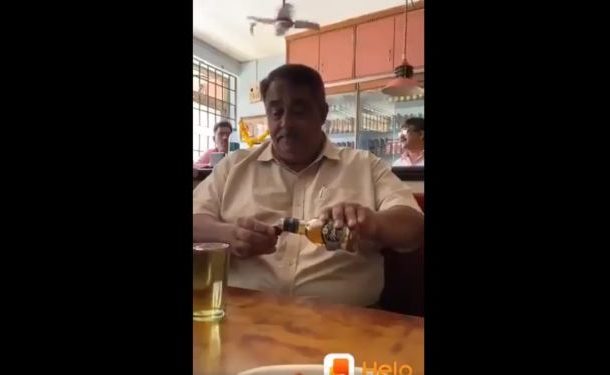 True Corona Warrior: Indian Man Uses Alcohol to Sanitise Hands in a Bar - Video