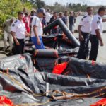 Two sailors killed as Mauritius oil spill clean-up boats collide