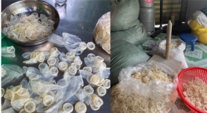PHOTOS: Police seize 324,000 used condoms being washed and resold in a raid