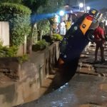 Gutter ‘swallows’ Taxi in Accra rains