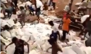 VIDEO: Nigerians loot warehouses full of free Covid-19 relief items