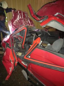 PHOTOS: Two persons crushed to death as container falls on their car