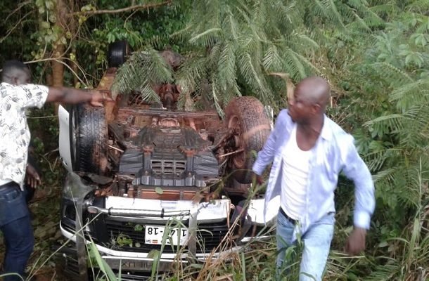 PHOTOS: Abronye DC escapes unhurt after near-fatal accident