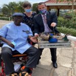 Kufuor gifts two peacocks to new friend Gregory Andrews