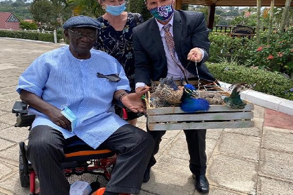 Kufuor gifts two peacocks to new friend Gregory Andrews