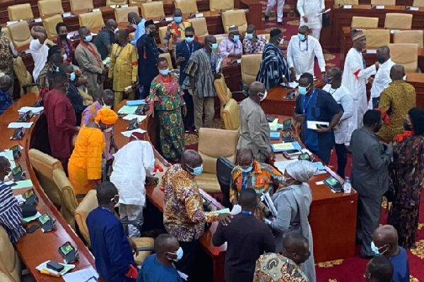 Military brutalities: Minority storms parliament in red armbands