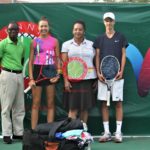 Two teen Tennis Players present items to Tennis Foundation Ghana