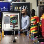 Twellium Industrial Company Limited presents citation to Bronze medalist Samuel Takyi