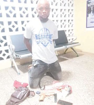 Motor rider nabbed with weapons, cash