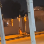 VIDEO: Jilted lady drags her butt on the street to curse ex boyfriend who dumped her