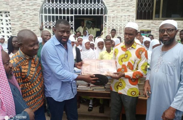 Majority Chief Whip donates computers, books to basic schools in his constituency