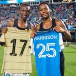 Ghana's Harrison Afful swaps jersey with Chelsea star Raheem Sterling