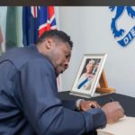 Asamoah Gyan signs book of condolence opened in memory of Queen Elizabeth II