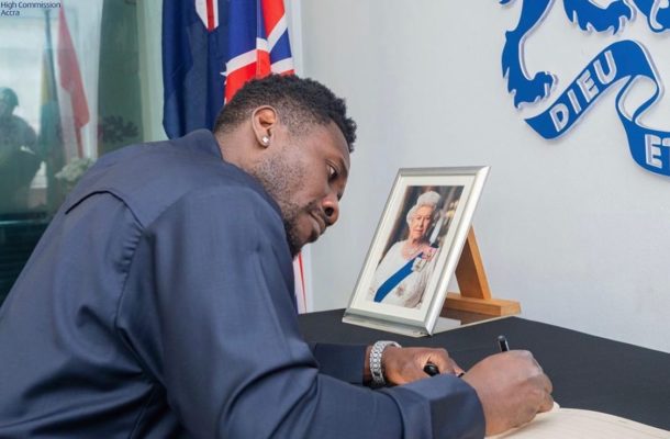 Asamoah Gyan signs book of condolence opened in memory of Queen Elizabeth II