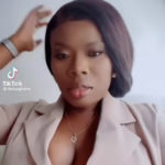 Delay flaunts her cleavage in new video