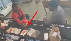 Woman caught on camera stealing an iPhone from a restaurant (Video)