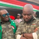 A/R: Police invite 8 NDC Reg. Execs for campaigning in Military camouflage