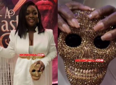 Jackie Appiah's skull-shaped clutch draws attention at an event
