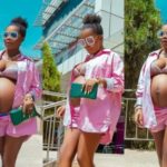 Mzbel puts baby bump on display in fashionable outfit