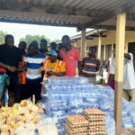 John Dumelo provides relief items to Akosombo Dam spillage victims