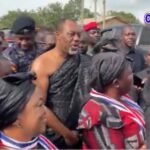 NPP woman leads chants for NAPO on his arrival at John Kumah’s One-Week event