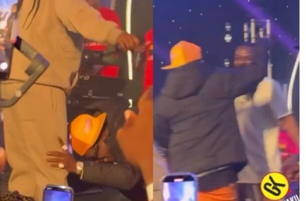 Shatta Wale hugs Samini, kneels before Daddy Lumba as he performs in UK [Video]