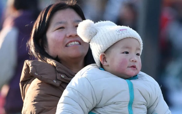 China introduces first national child subsidy to counter falling birth rates