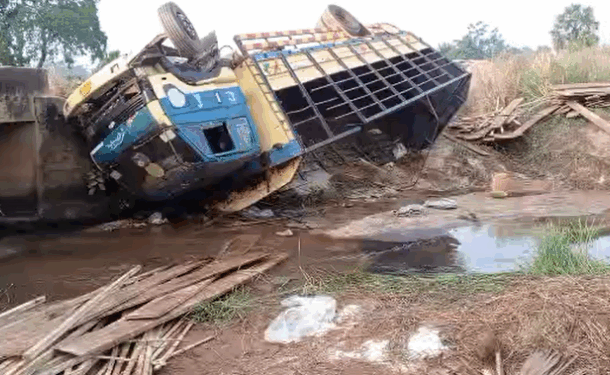 One dead, several injured as cargo truck plunges into broken bridge in North East Region